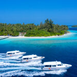 Arriva normal high-speed boat on the water in the Maldives, showing private speedboat transfer prices and options.
